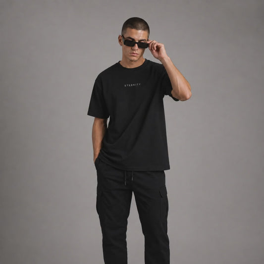 Model wearing the tee — Black